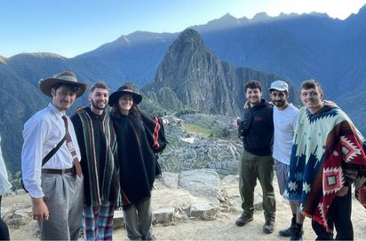Challenges Abroad team members posing in front of Machu Picchu in Peru