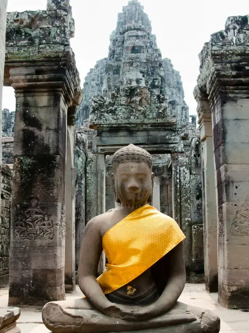 Traditional Buddha statue at a historic temple visited during the Queen Mary College Thailand cultural immersion programme.